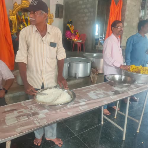 Rice being served along the long table